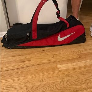 Nike Black and Red Sport Duffle with White Logo